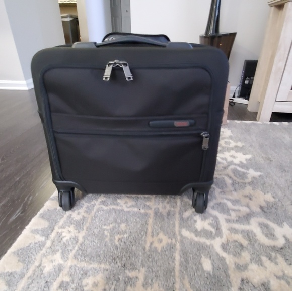 rolling briefcase tumi